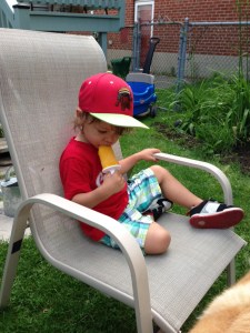 The foodNURDling enjoying his first (of many) popsicles.